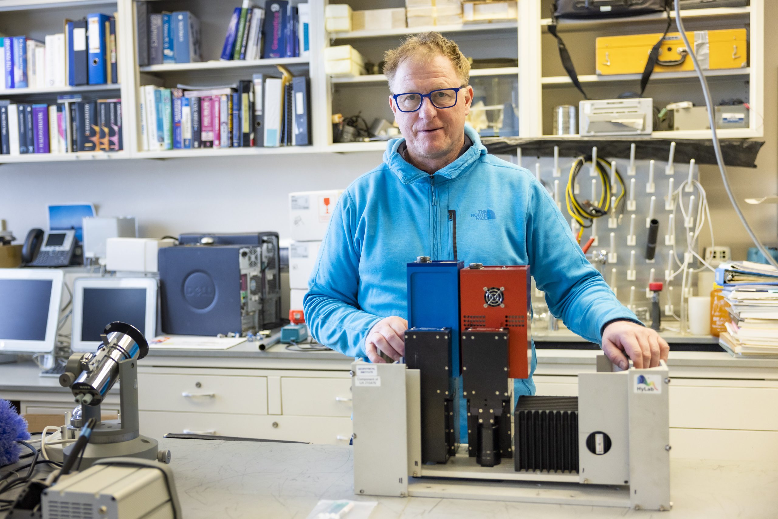 Martin Steufer stands beside a hyperspectral camera system. Steufer is the director of UAF Geophysical Institute's HyLab. UAF/GI photo by JR Ancheta.